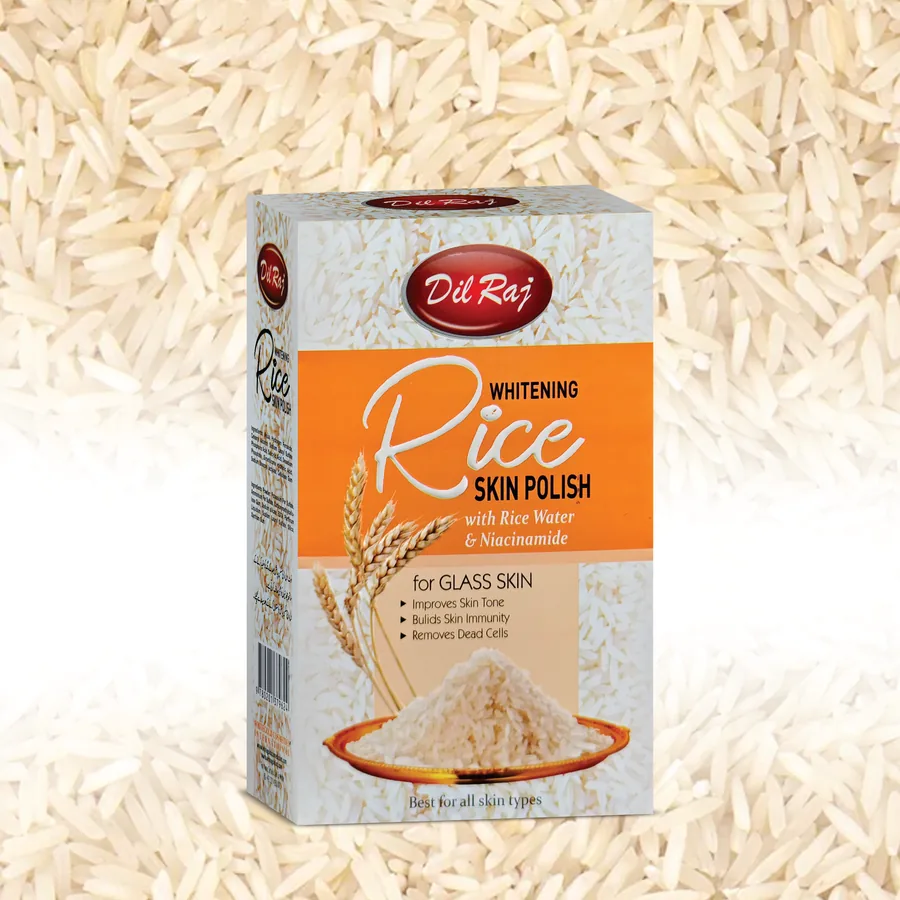 Dil Raj Whitening Rice Skin Polish box on a bed of rice grains